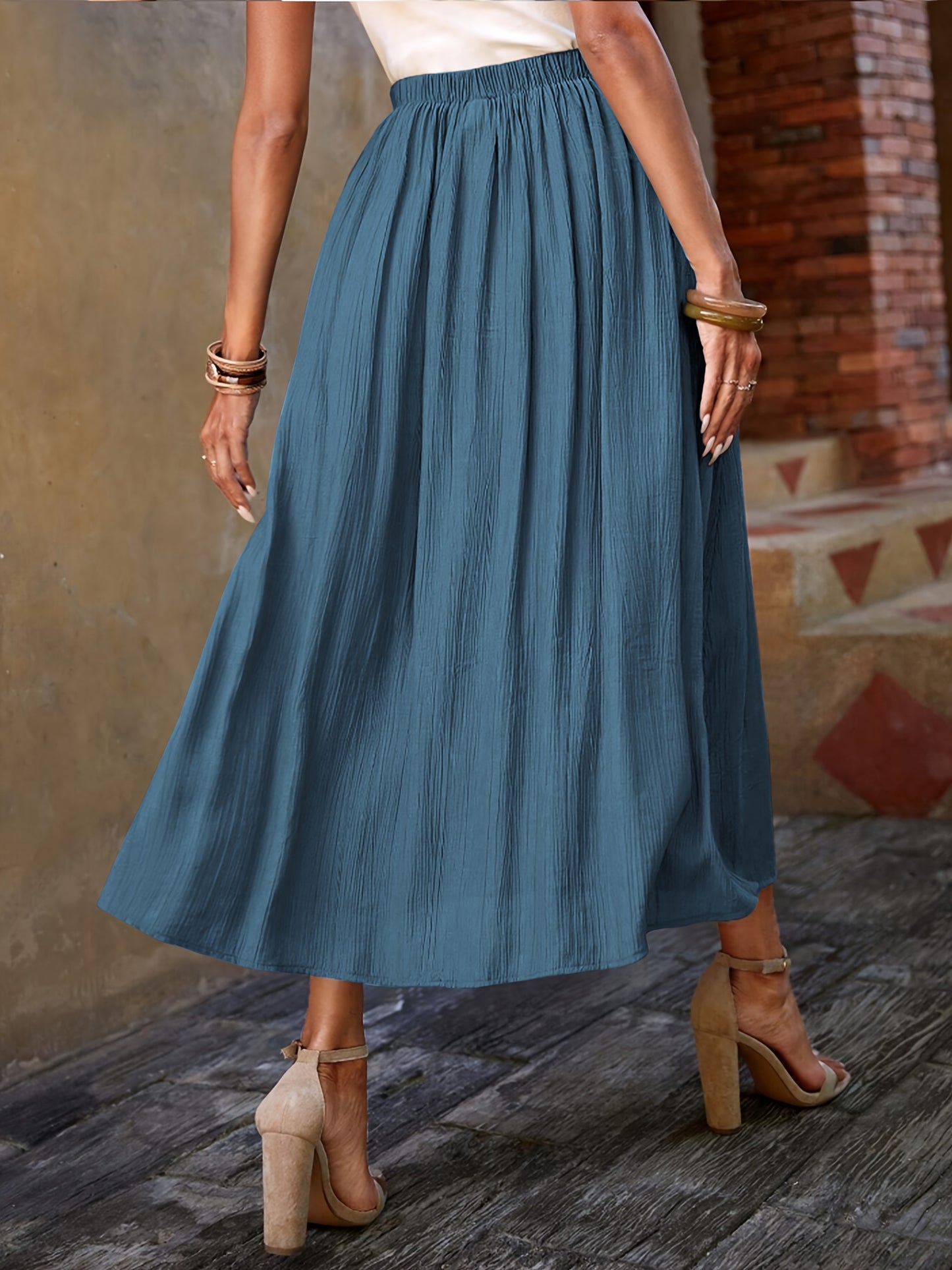 SOLEA – Eleganter A-Linien-Midirock